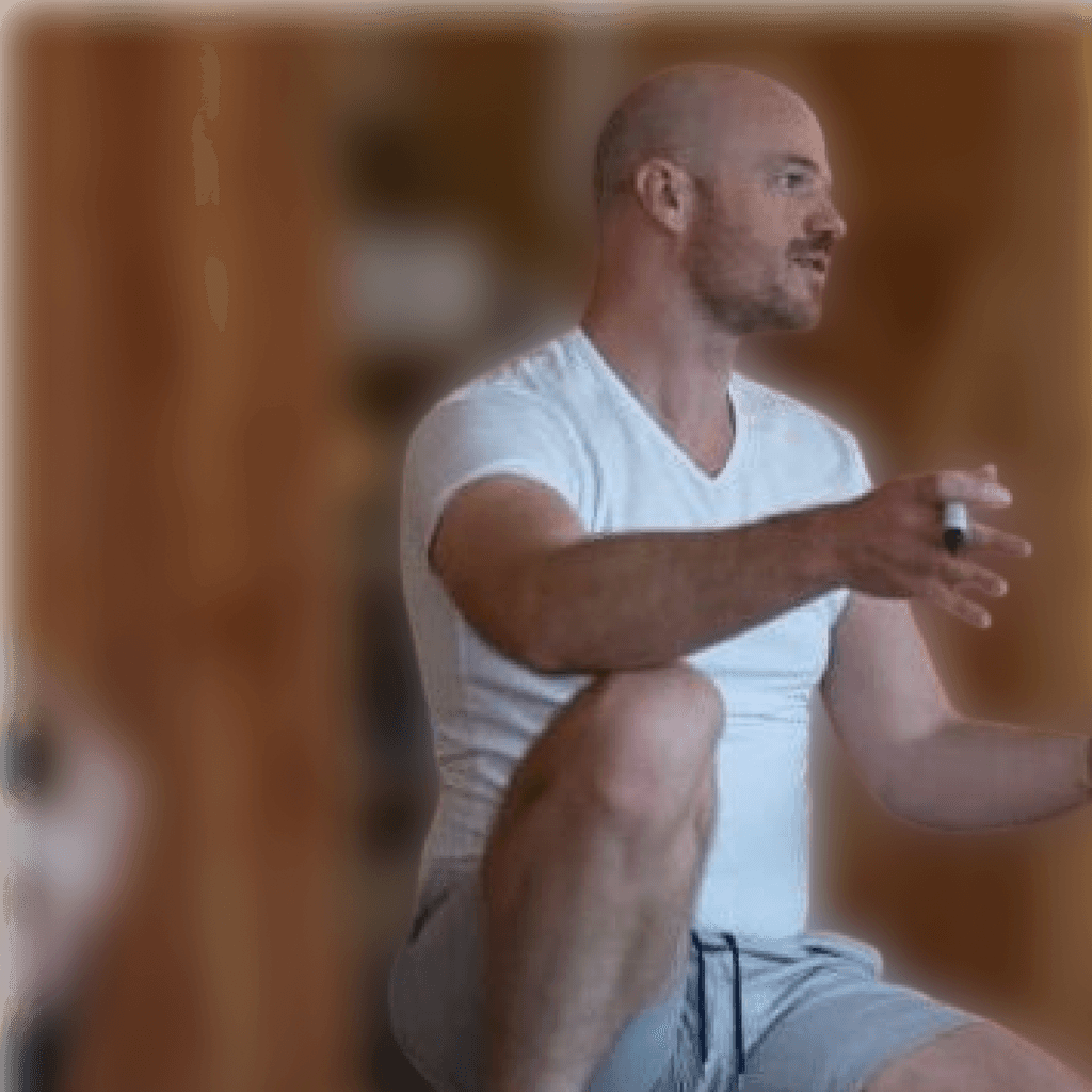 framer-legacy-about-team-frits: cutout portrait of a bald man kneeling and gesturing