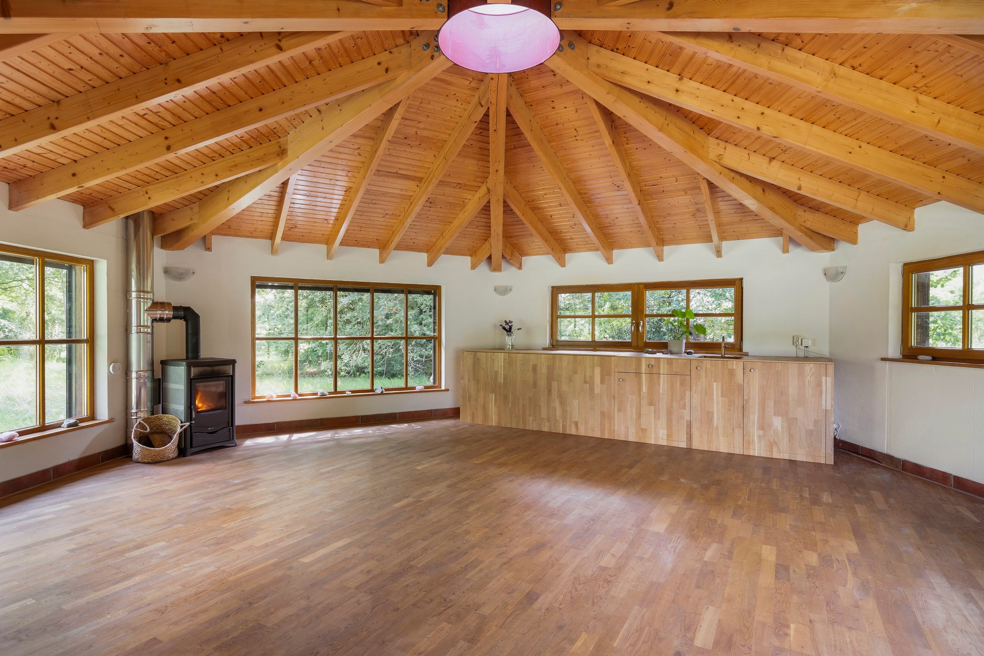 Nature Temple for intimate sessions (interior with wooden-beam ceiling)
